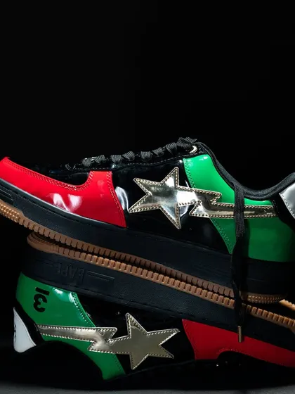 An artistic stacked shot of the Bapesta UAE edition, creating a mirror effect that showcases its unique design.
