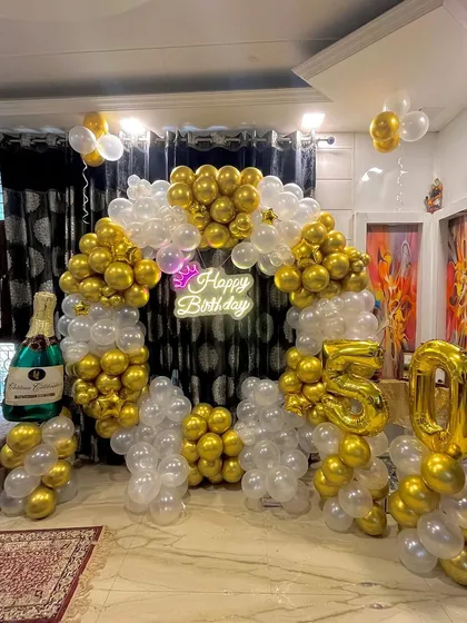 Another perspective of the elegant 50th birthday balloon arrangement.