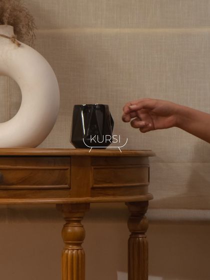 My teak console table, a versatile piece that speaks to both style and substance. It’s built to last a lifetime.