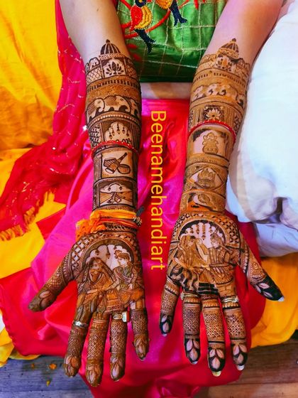 This full bridal mehandi tells the story of the wedding ceremony. The design includes portraits of the couple, family members, and auspicious wedding symbols.