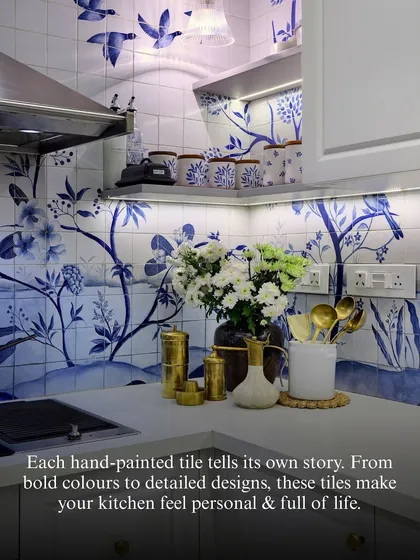 A kitchen can be a canvas for artistry. These hand-painted tiles tell a story, bringing a layer of personality and life that transforms a simple wall into a unique focal point. It is in these quiet, crafted details that a house truly becomes a home.