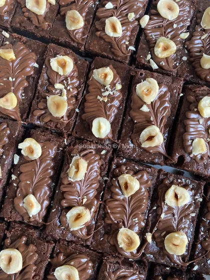 A close-up of my Nutella brownies, topped with toasted hazelnuts. The combination of rich chocolate and nutty flavor is just divine.