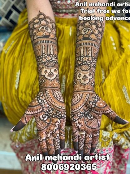 A classic design with a large peacock on the forearm and dense, swirling patterns on the palm. This style is timeless and always looks stunning on a bride.