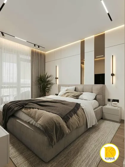 Another angle of the bedroom, showing the interplay of light and reflection from the mirrored panels.