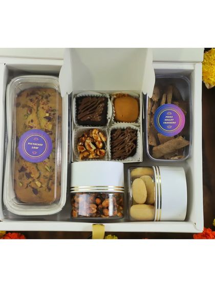 Another look at my large celebration hamper, showcasing the variety of sweet and savory items neatly packed and ready for gifting. Each item is sealed for freshness.