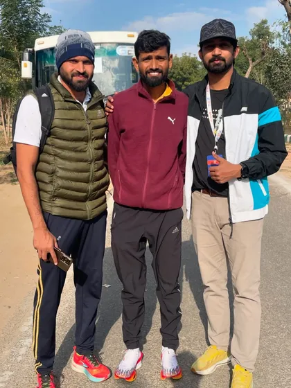 A pre-race photo with fellow runners and athletes. The camaraderie in the running community is always a highlight of marathon events.