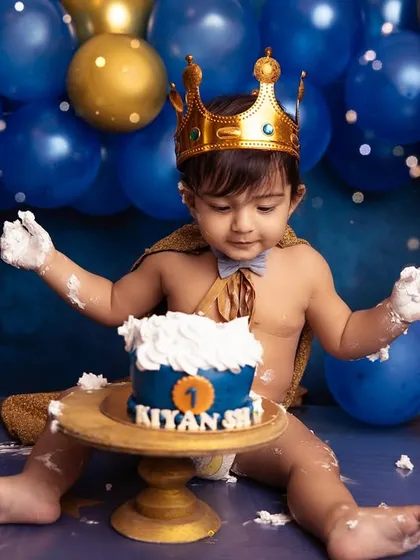 A cake fit for a little king! This royal-themed cake smash was all about celebrating his first year with playful mess and majestic fun. I love capturing the pure delight as they dig in for the first time.