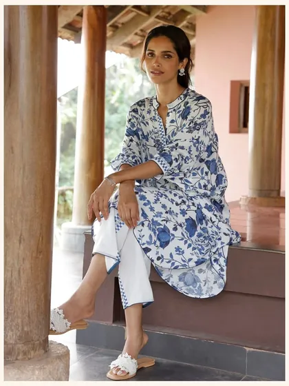 This blue and white printed tunic is a versatile piece that can be worn as a short dress or paired with pants. The relaxed fit makes it super comfortable.