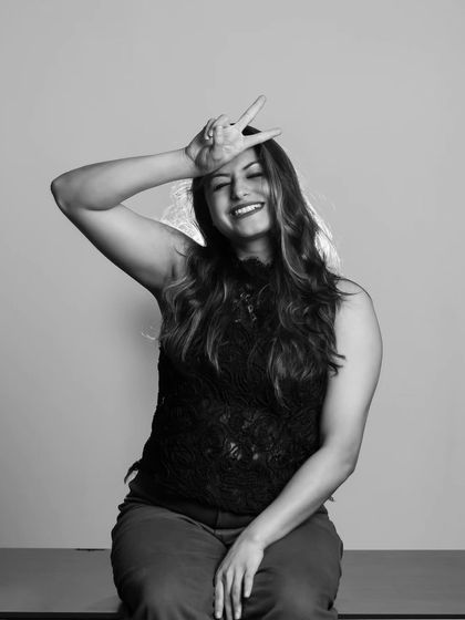 Another example of capturing personality in the studio. This fun and lighthearted black and white photo shows a different side of the subject.