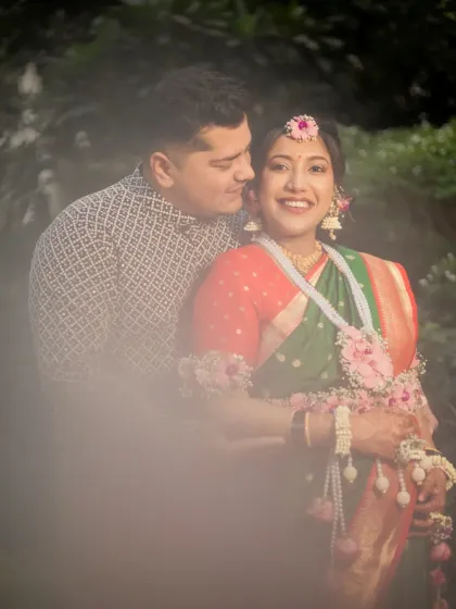 A dreamy, soft-focus portrait of the couple sharing a close moment, creating a romantic and ethereal feel for their maternity pictures.