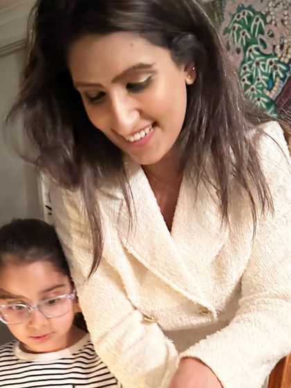 With my little one. My journey as a mother and a yogi are intertwined. I believe that understanding ourselves and our own energy is the first step to guiding our children with love and patience.