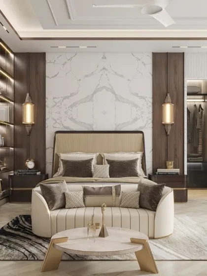 A master bedroom featuring a striking book-matched marble headboard and an integrated walk-in closet. The renders highlight the seamless design and luxurious material choices.