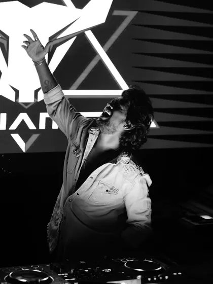 Lost in the music. This shot captures a moment of pure passion and energy behind the decks.