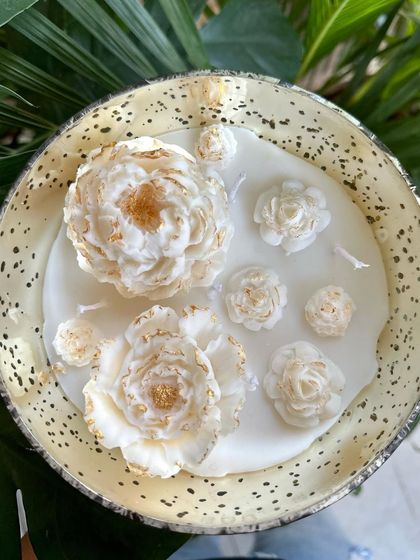 A top-down view of my hand-decorated peony bowl candle. The hand-painted soy peonies look ethereal, making this a perfect gift for Mother's Day or any special occasion.