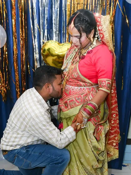 Another angle of the father-to-be showing affection for the baby bump. These are the emotional memories we love to preserve for families.