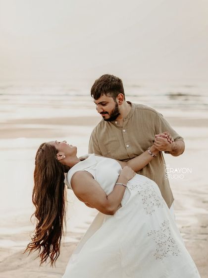 A playful dip during their dance on the beach. I always encourage couples to be themselves, because that's when the real magic happens.