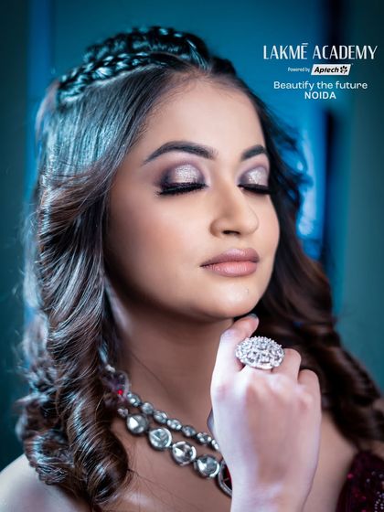 A detailed shot of the eye makeup, showing the beautiful blend of silver and maroon shadows.