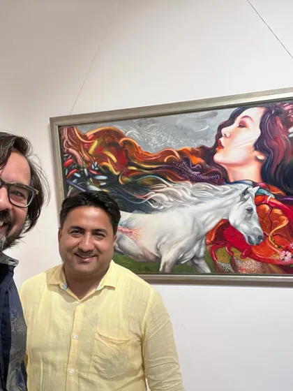 With a friend at the Visual Arts Gallery. Sharing my work with friends and supporters is a huge part of the journey.