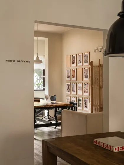 A peek into our main workspace from the entrance, with the "Purple Backyard" name marking the threshold. This view shows the open and layered nature of our studio design, encouraging a sense of flow and transparency within the team.