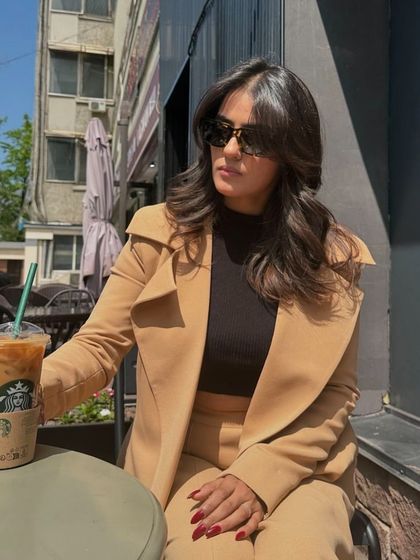 Actress Kavya Thapar getting her vacation nails done with us. She chose this gorgeous 'bloodstain' red gel polish for a look that's both trendy and classic. A perfect, bold color that looks great on anyone.