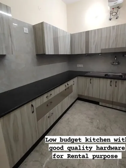 A full view of the low-budget rental kitchen. It proves that practical, good-looking kitchens are achievable for any requirement.