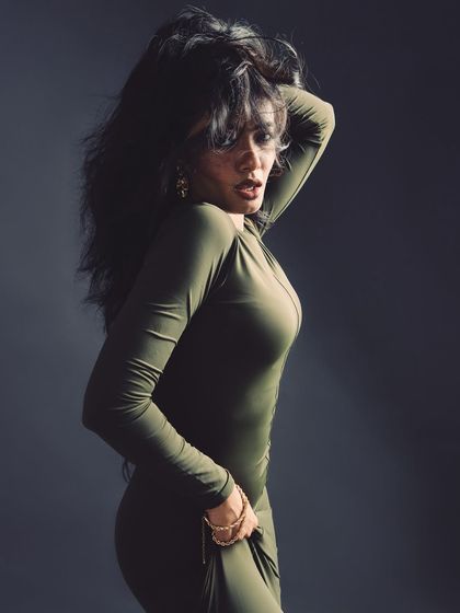 A powerful and expressive shot with dynamic hair movement.