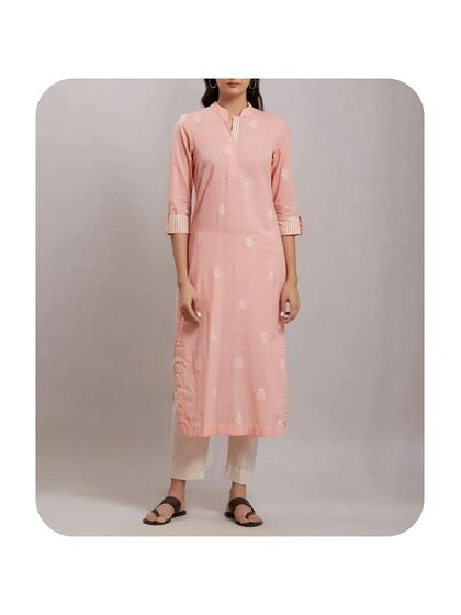 A soft pink cotton kurti with a mandarin collar and roll-up sleeves. This is a great example of a smart-casual piece that I can tailor for your everyday comfort and style.