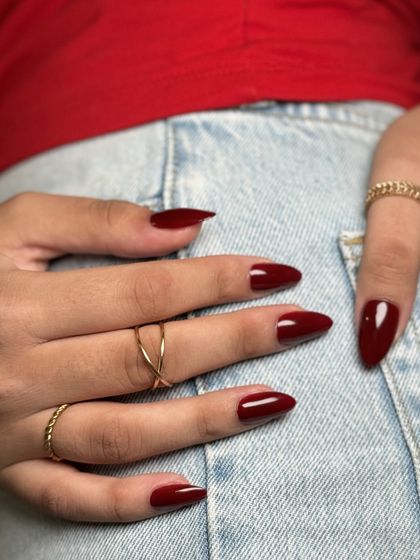 Another view of the classic red almond manicure. It's a versatile look that exudes confidence and style.