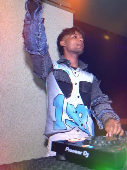 Hand up, feeling the vibe. I love to move and dance along with the crowd.
