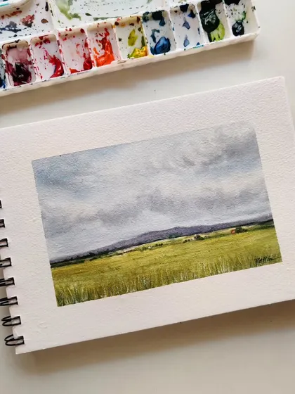 The final version of my watercolor landscape. After a few tries, I was happy with the sky and the overall composition. Practice really does make progress.