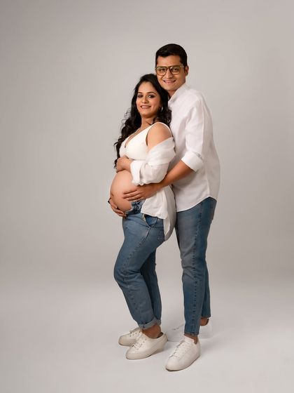 A casual and relaxed portrait in matching white shirts and jeans. This shows that you can be comfortable and still get beautiful, connected photos.