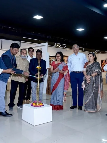 Participating in the lamp lighting ceremony for a group exhibition at Raja Ravi Varma gallery in Pune.