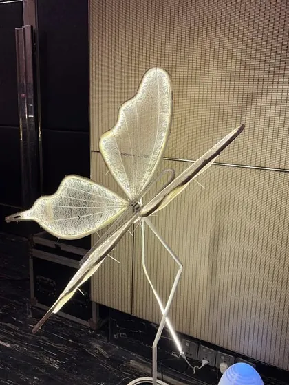 Details matter in our decorations. This elegant, illuminated butterfly prop was used as a standalone decorative piece to enhance the overall theme of the party.