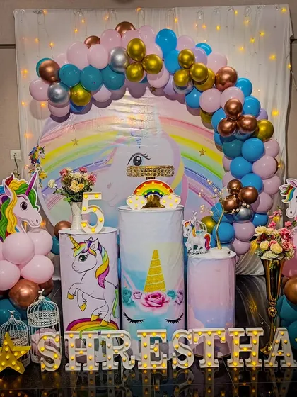 A magical unicorn-themed birthday party setup. With a rainbow pastel balloon arch, unicorn cutouts, and sparkling details, we bring fantasy worlds to life for your child's special day.