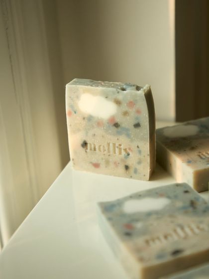 The 'Sweet Fig' bar catching the light, showing off its terrazzo-like appearance.