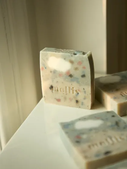 The 'Sweet Fig' bar catching the light, showing off its terrazzo-like appearance.