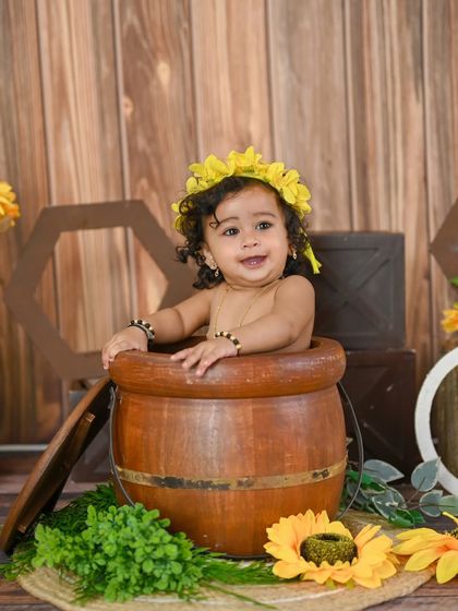 A duplicate of image 111, a sunny and cheerful first birthday photo.