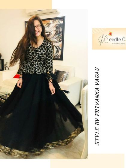An old saree was reimagined into this chic black lehenga set, featuring a modern peplum-style top. The original gold border adds a beautiful finishing touch to the skirt.