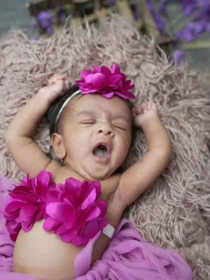 A sleepy yawn from a flower princess. I always take my time and wait for these candid, adorable moments during a session.