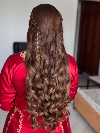 A closer look at the chain braids in this artistic half-up style.