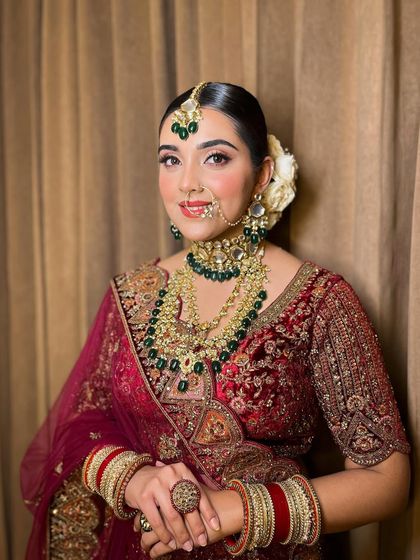 Minimal magic for this beautiful bride. Her makeup is soft and subtle, with a focus on glowing skin and gently defined eyes, letting her natural beauty be the star of the show.
