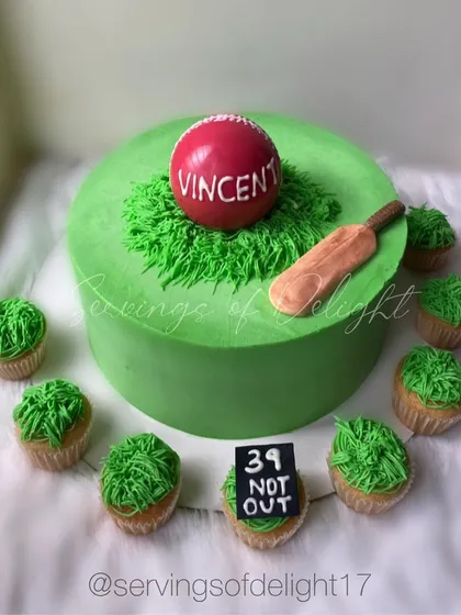 A special order for a cricket fan's 39th birthday. This set included a cricket pitch cake and matching cupcakes with buttercream grass. 39 and not out!