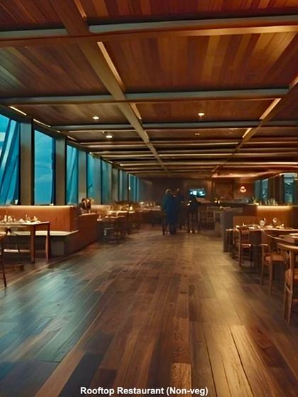 A rendering of the proposed rooftop restaurant for the Russell Market project. This space was designed to offer panoramic city views, creating a new public destination and adding economic viability to the conservation effort.