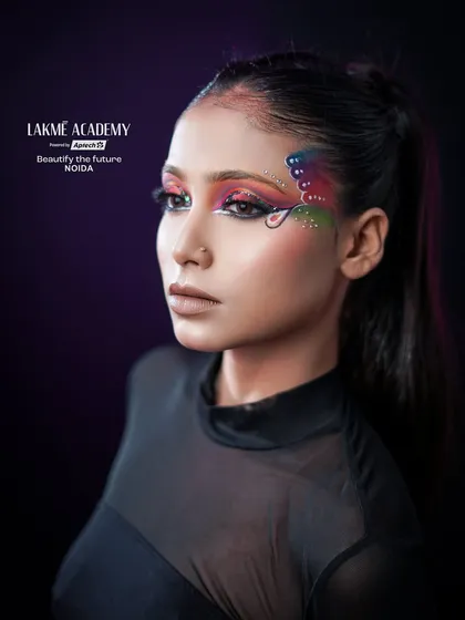 A side profile of the butterfly eye makeup, showing the clean lines and vibrant colors. This angle highlights the skill and precision involved in creating such a look.