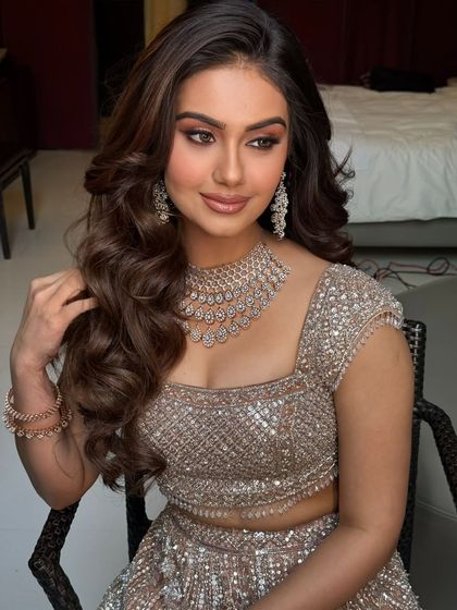 Soft, voluminous waves are a popular choice for engagement or reception looks. I use extensions to add fullness and create these beautiful, flowing curls that photograph wonderfully.