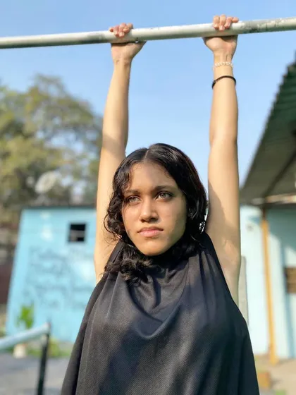 Strength and beauty are one and the same. This young athlete embodies the grace and power that calisthenics builds.