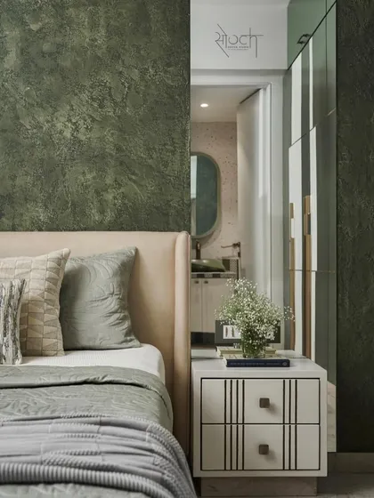 Another view of the Olive Haven bedroom, showing the cohesive design and the connection to the ensuite bathroom.