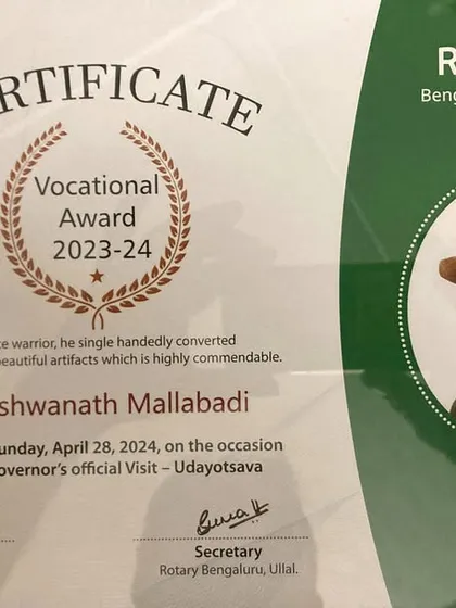 The Vocational Award certificate from Rotary Bengaluru Ullal, recognizing me as an "e-waste warrior" who single-handedly converted e-waste into beautiful artifacts.