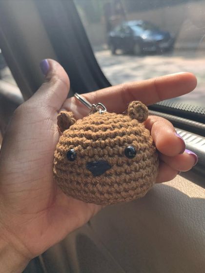 A simple and sweet bear face keychain, perfect for adding a touch of cuteness to your belongings.