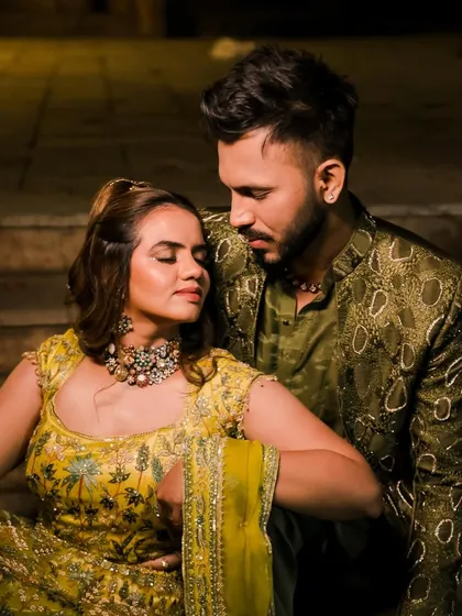 An intimate moment from a wedding celebration. For the bride, I crafted a soft, half-up hairstyle that feels romantic yet effortless, perfectly matching the groom's sharp, modern cut.